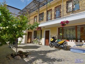 Нептун у реки Гостевой Дом