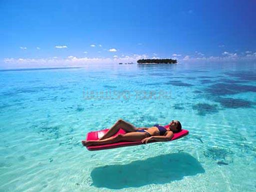 Вид на лагуну Отель Banyan Tree Maldives Vabbinfaru 5